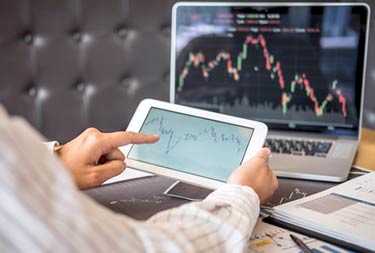 Currency trading at home with tablet or computer